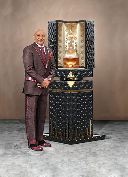 Asghar Adam Ali Ibrahim , owner of Nabeel Perfumes who designed the record-breaking bottle
