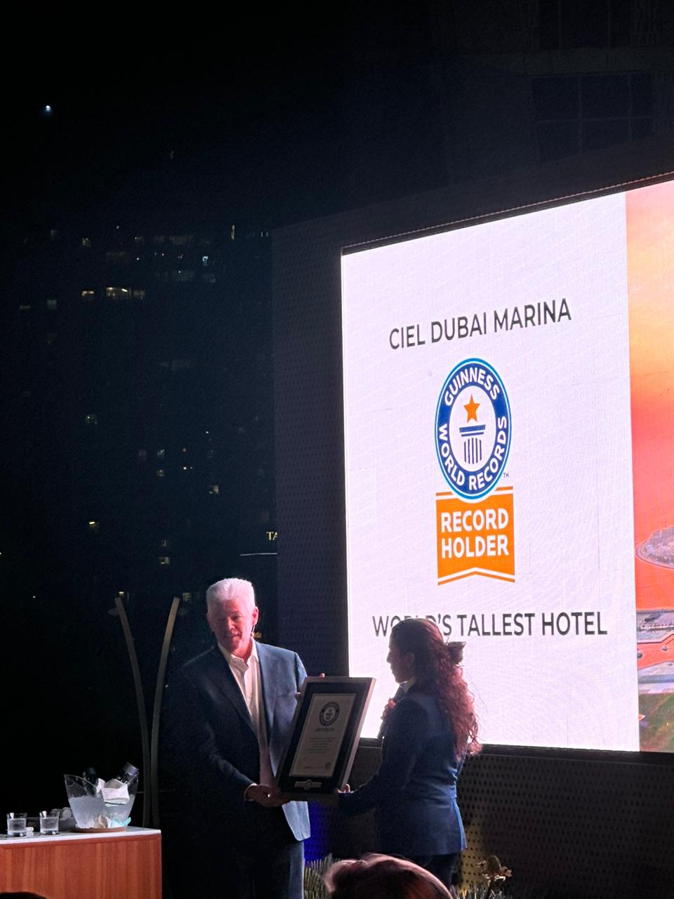 GWR presenting the certificate to client