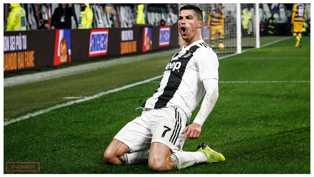 Cristiano Ronaldo celebrating scoring a goal on the field