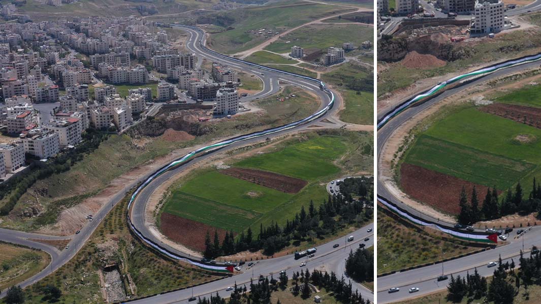 Aerial view of the largest suspended banner embodying the Jordanian flag